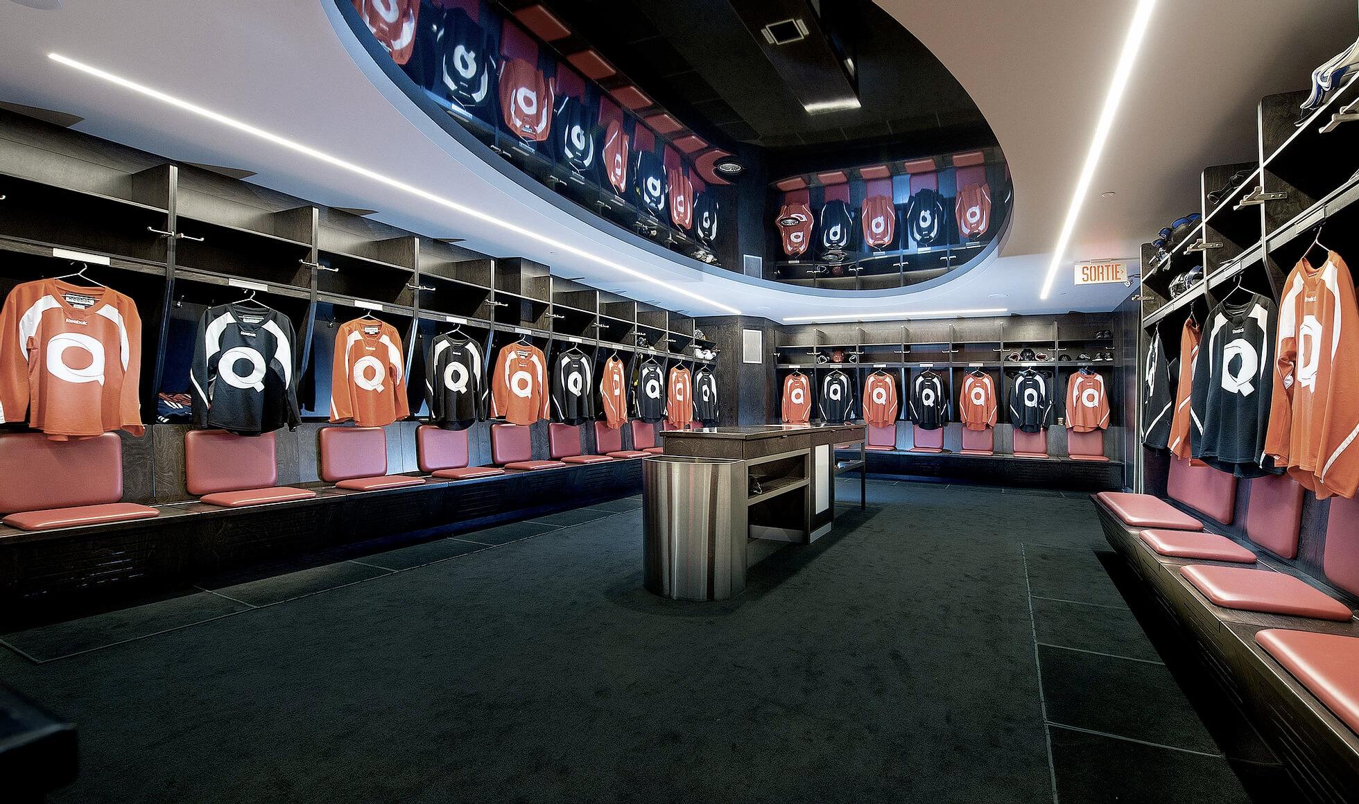 Luxury hockey dressing room at Hockey Etcetera with individual player stalls, each with their own Quartexx practice jersey.