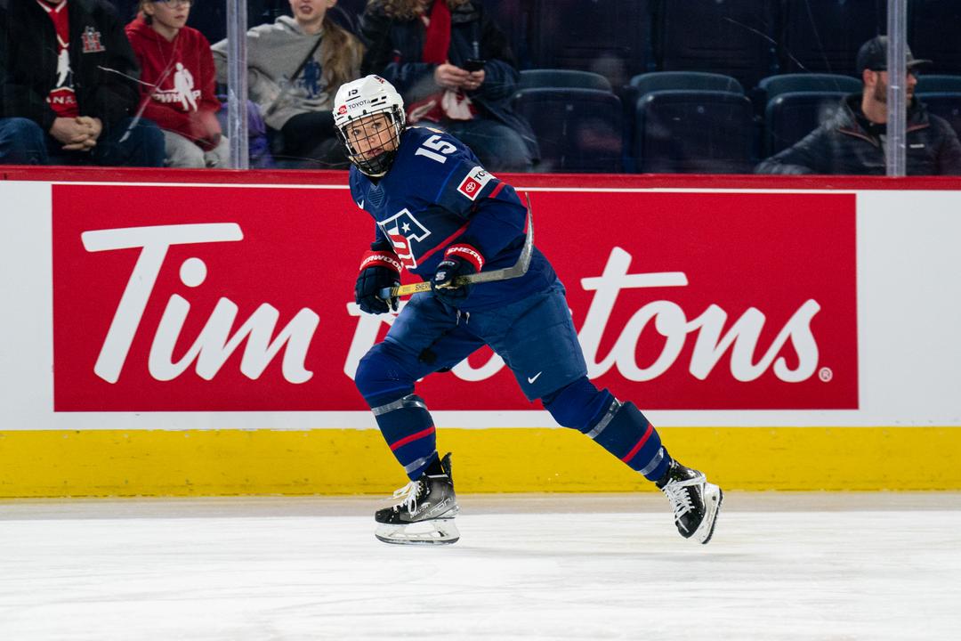 Quartexx Management client Savannah Harmon skating up the ice for Team USA